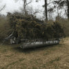 Pontoon Boat With A DIY Duck Blind Covered In Camoflouge