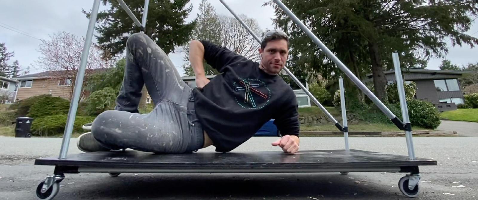Builder Posing On Top Of His Completed Storage Cart 